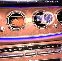 Car air conditioning control panel with wooden finish