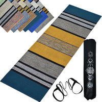 Set of yoga mats with striped patterns and a carrying strap on a white background