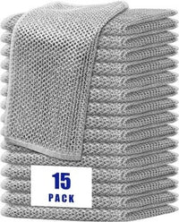 Stack of gray towels with a '15 Pack' label on a white background
