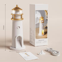White and gold lighthouse-shaped product with packaging, dimensions, and cable on a beige background