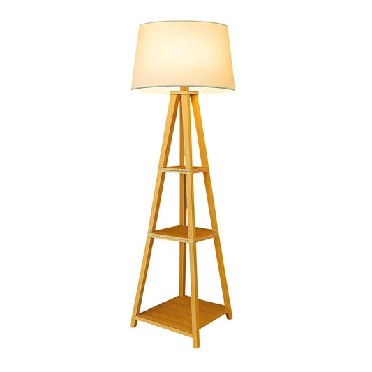 Wooden floor lamp with a beige shade on a white background