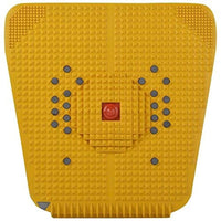 Yellow textured mat with a central red button on a white background