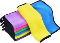 Set of colorful microfiber cloths on a white background